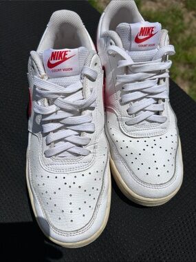 Nike White Court Vision Sneakers with Red Logo Accents